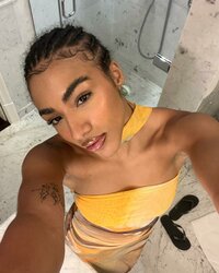 Photo by Megan Ria on May 23, 2024. May be a selfie of 1 person, braids, long hair, makeup and...jpg