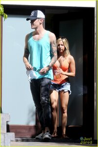 ashley-tisdale-orange-one-piece-20.jpg
