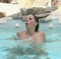 Gianna Michaels emerging from water.gif