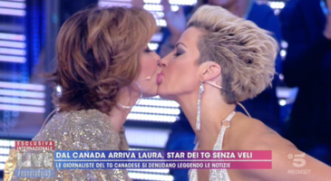 https:_media.gossipblog.it_8_83b_bacio-milly.png