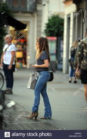 sabrina-impacciatore-takes-a-late-afternoon-walk-on-via-della-spiga-while-talking-on-the-phone...jpg